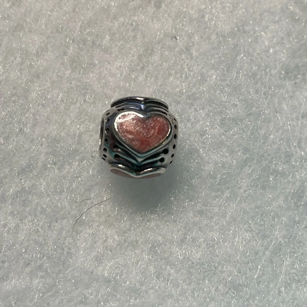 EUC Pandora Rose Enamel Hearts Charm Retired. In excellent condition.